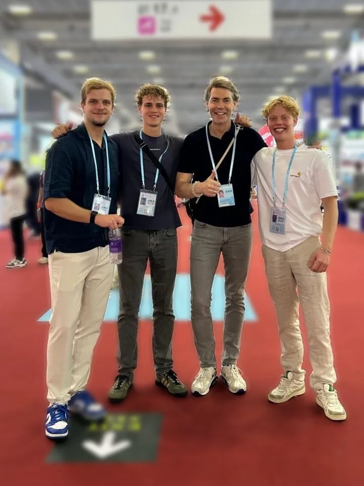The Juno team with a client at a trade fair